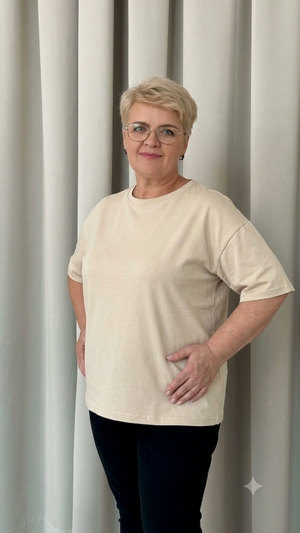 A casual, loose-fitting t-shirt with dropped shoulders.